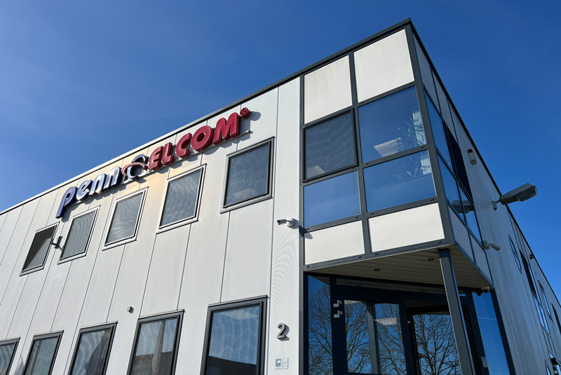 Penn Elcom Duitsland wit kantoorgebouw met logo