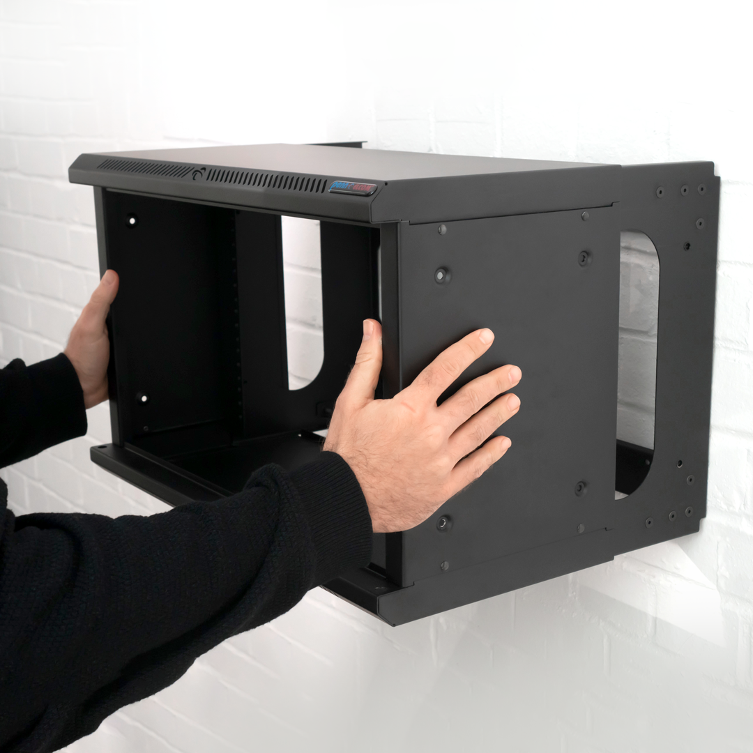 R6225 outer shell being removed from wall mounted rack frame